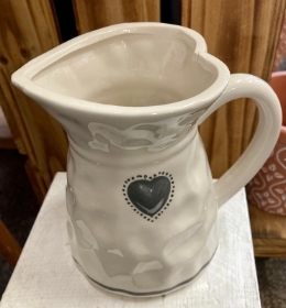 small white vase with grey heart